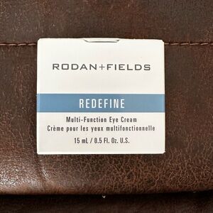 Rodan + Fields White and Blue Eye Cream Box
